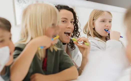 Kids brushing their teeth